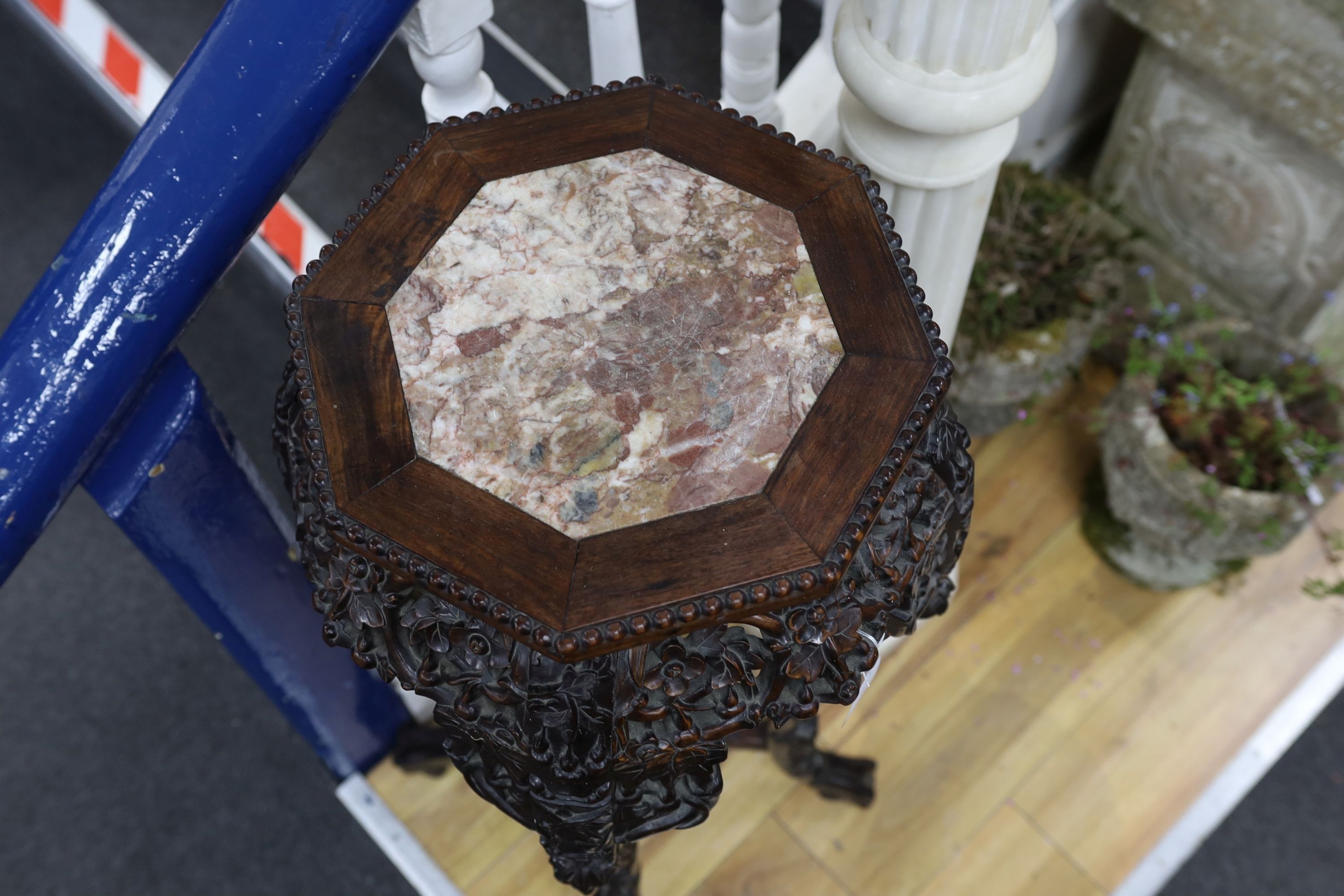 A Chinese hongmu marble topped jardiniere stand, early 20th century, height 90cm